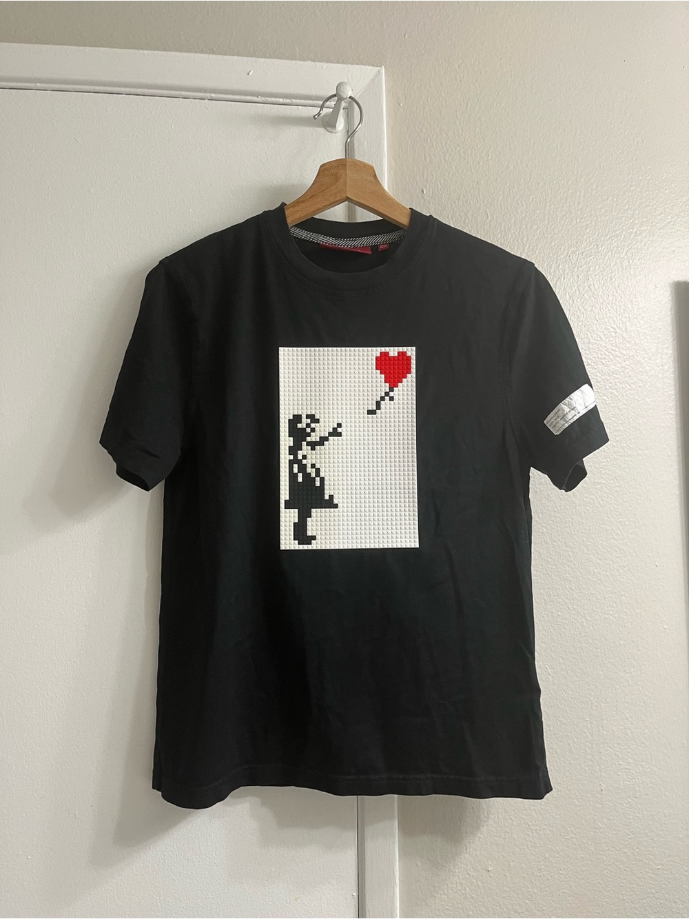 Mostly Heard Rarely Seen Black Tee with Red Heart Balloon Graphic